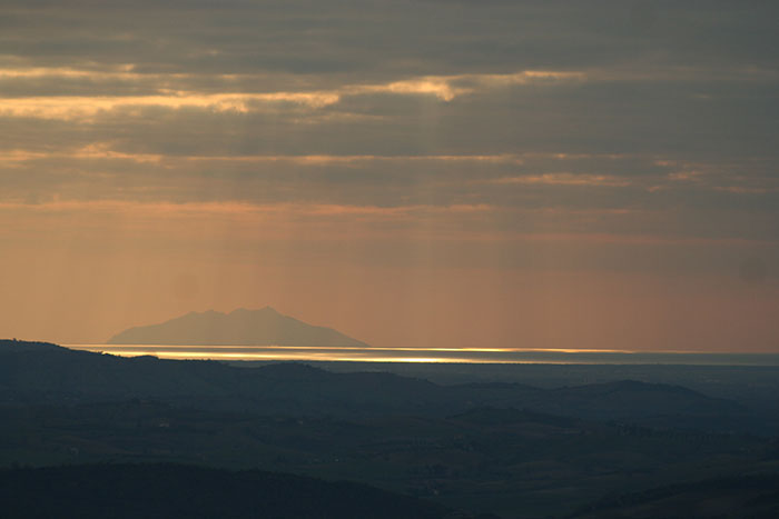 Sunset with view on the island of Monte Christo